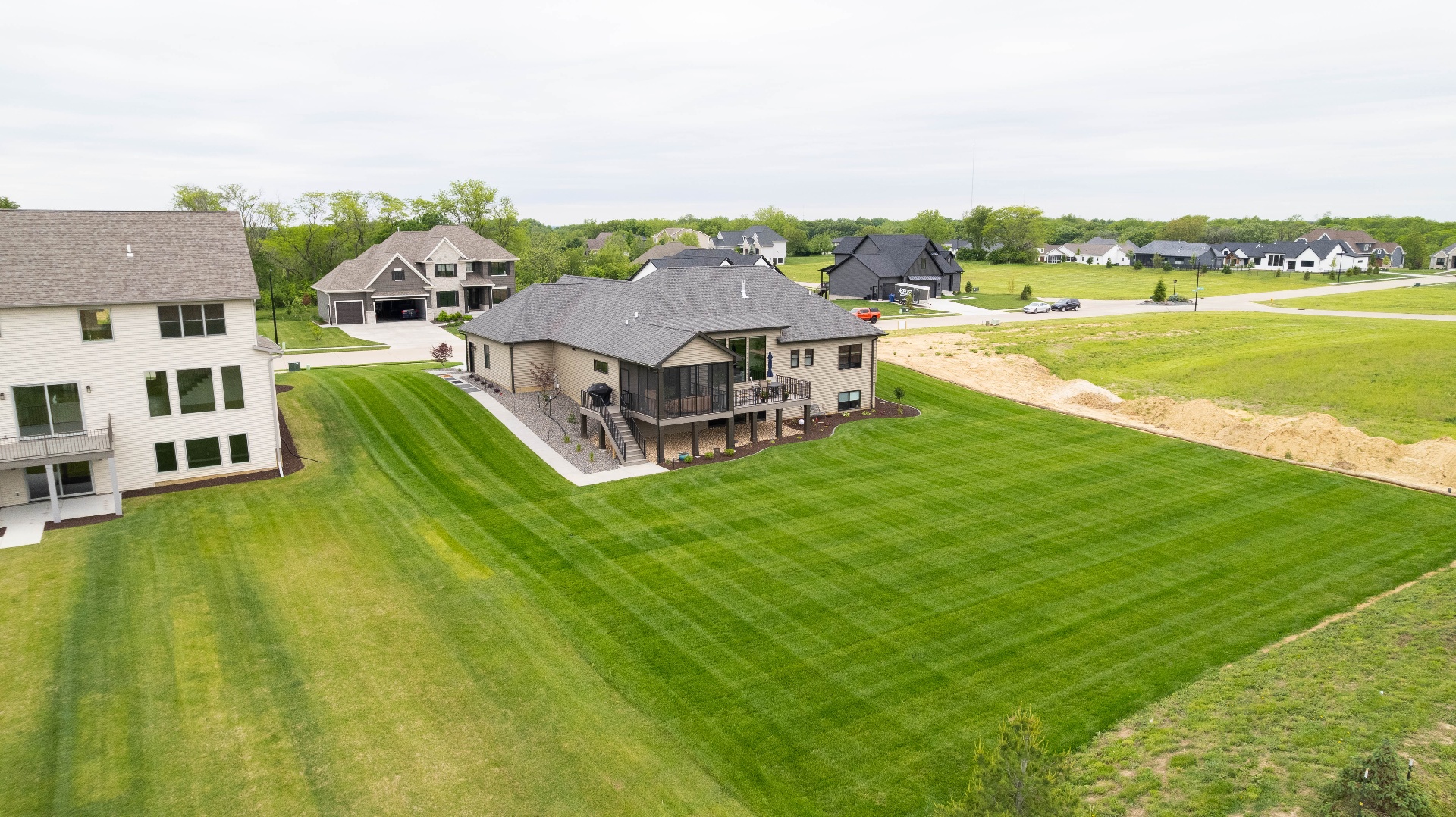 Aerial view of Iowa City Kerkhoff home with manicured lawn