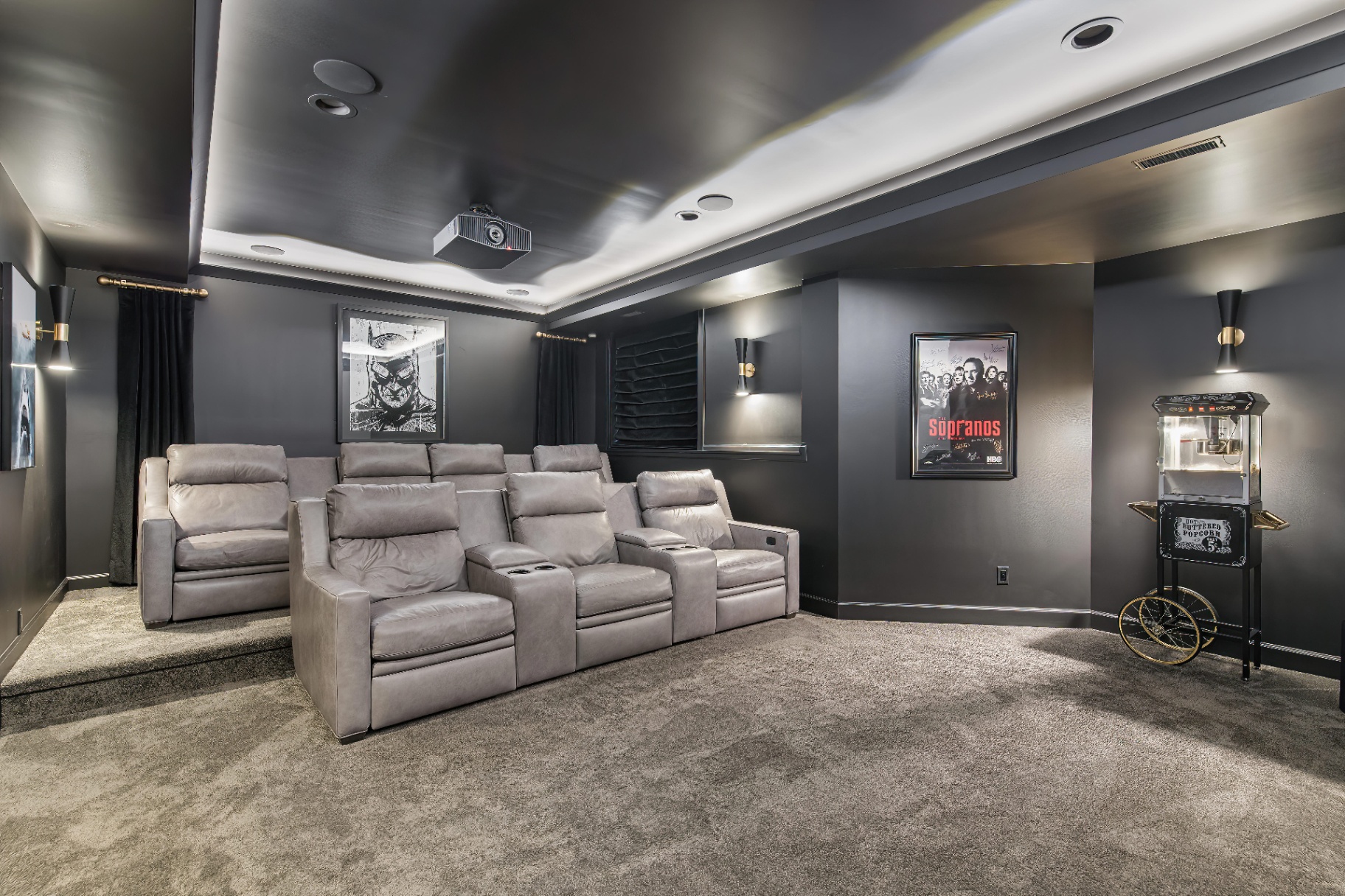 Private home theater with leather recliners and projector
