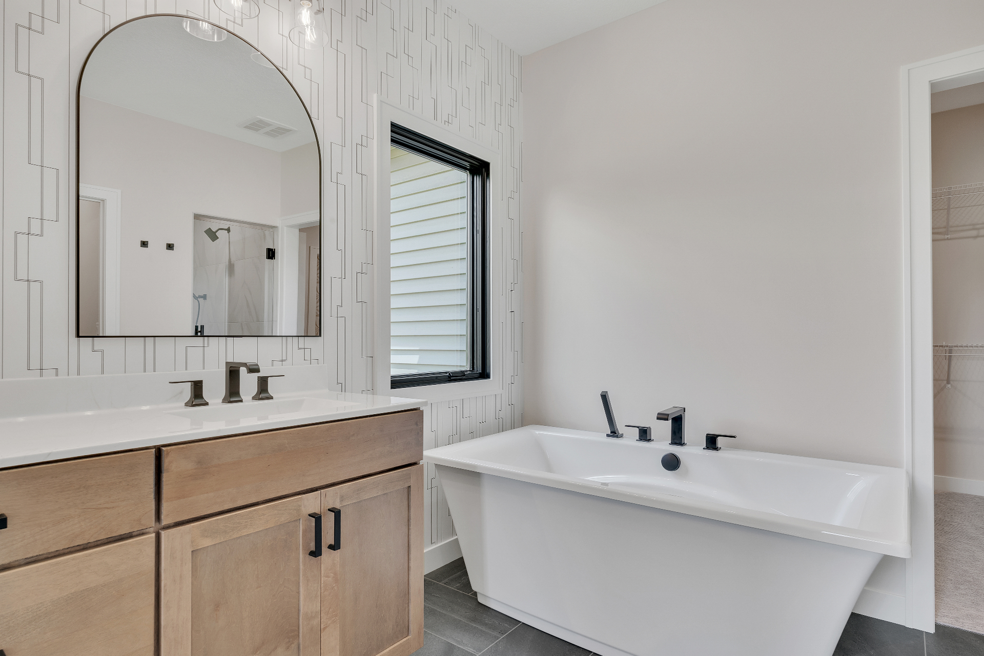 Minimalist master bath with soaking tub