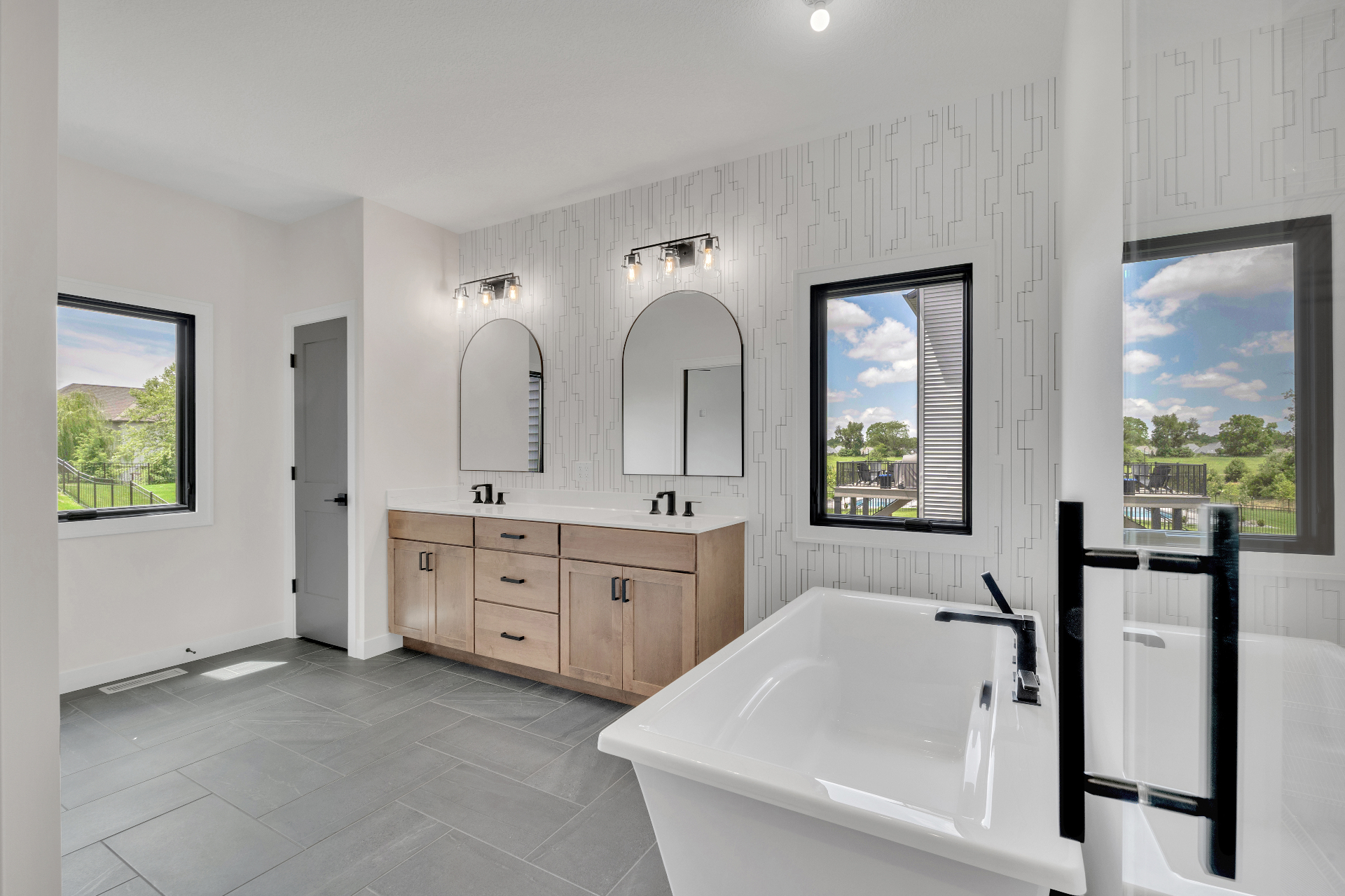 Spa-inspired master bath with freestanding tub